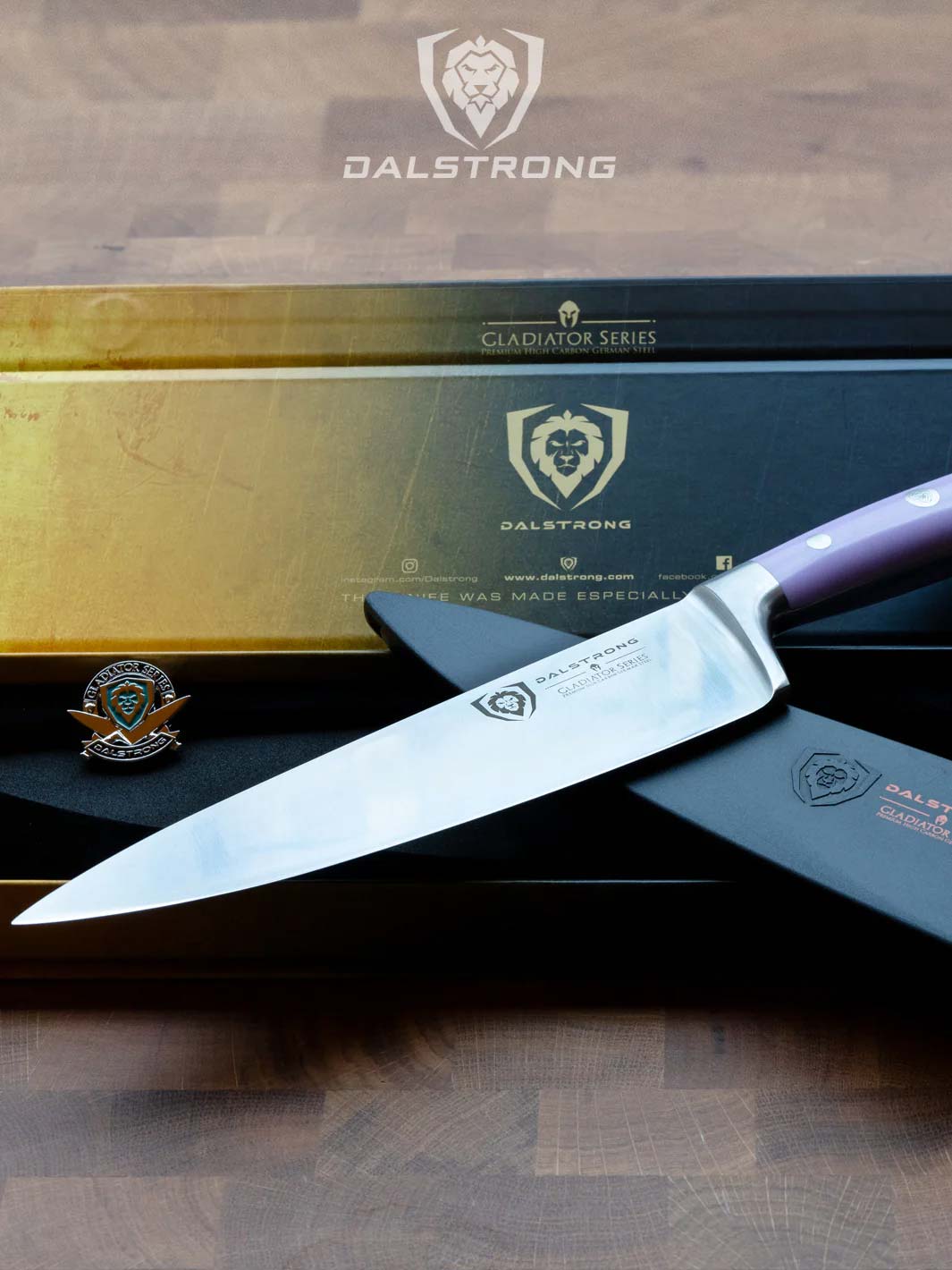Dalstrong gladiator series 8 inch chef knife with lilac handle and black sheath on top of it's premium packaging.