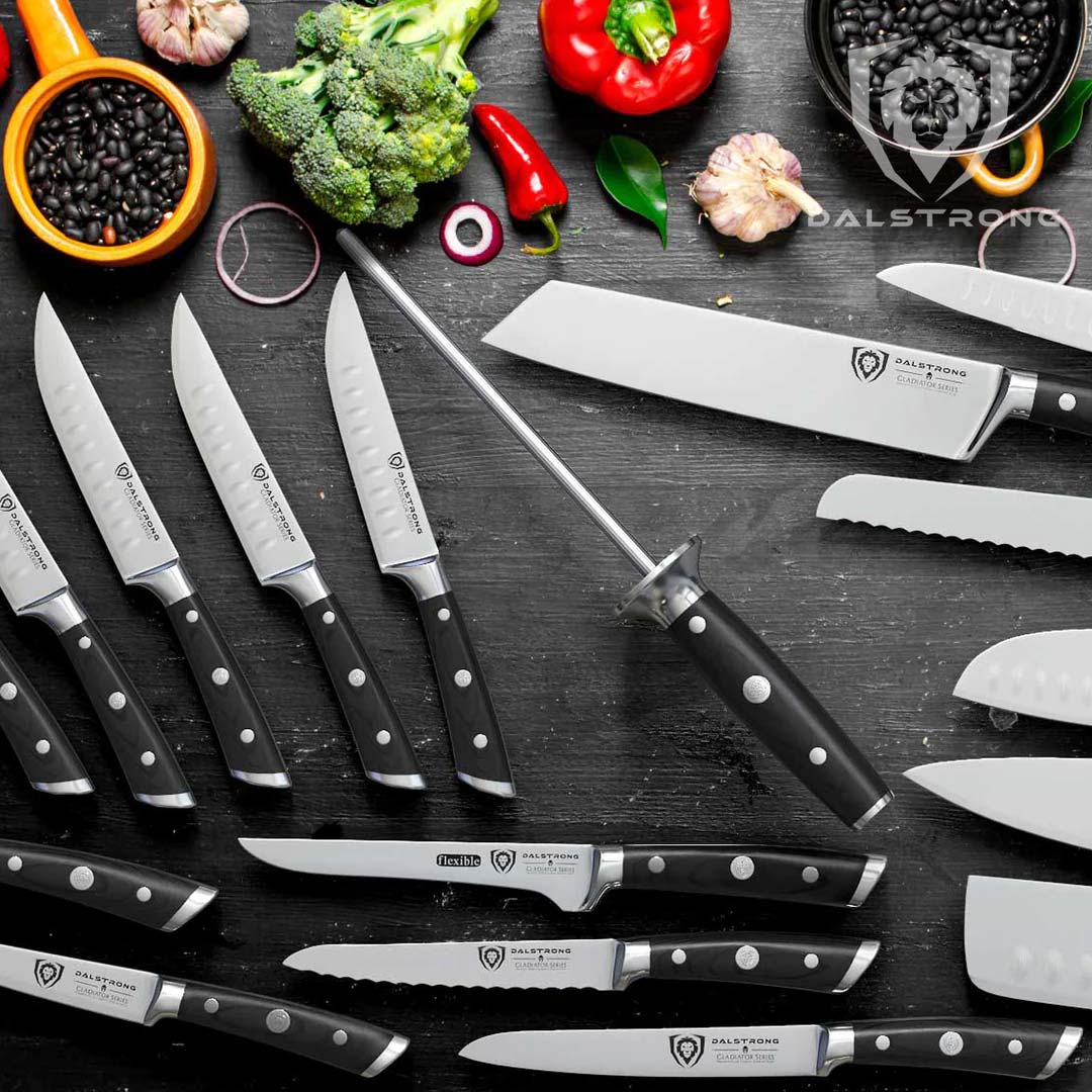 Dalstrong gladiator series 18 piece knife set with black handles and black beans at the top.