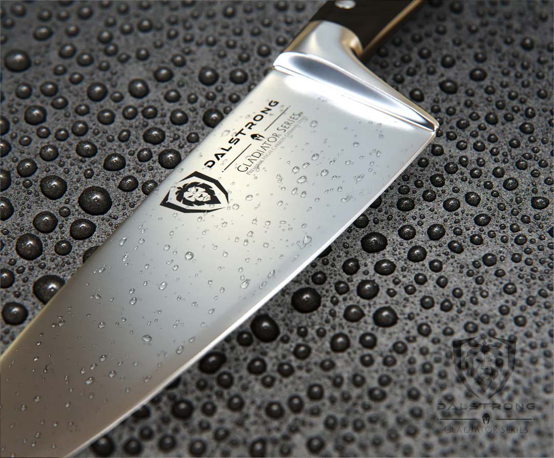 Dalstrong gladiator series 6 inch chef knife with black handle featuring it's blade with dalstrong logo.