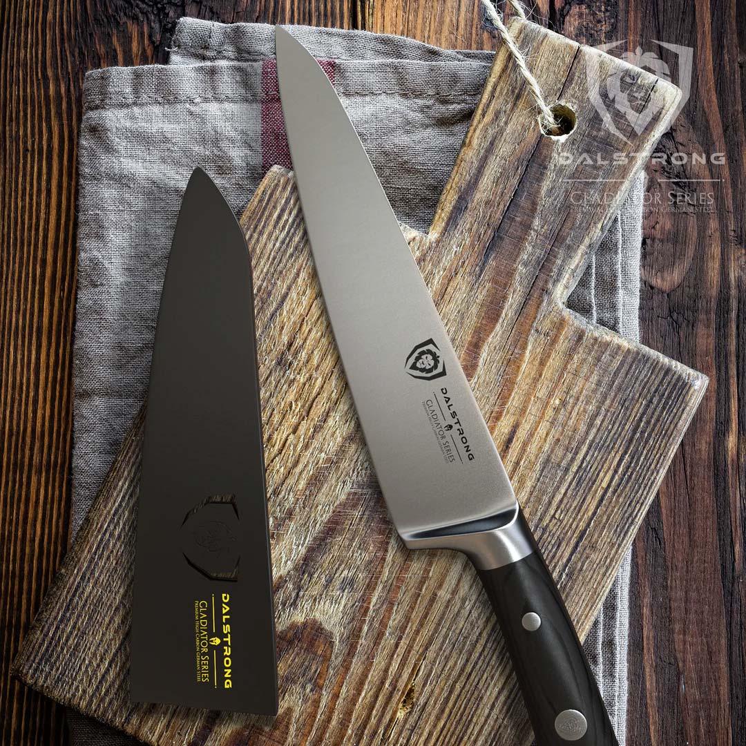 Dalstrong gladiator series 7 inch chef knife with black handle and sheath on a wooden cutting board.