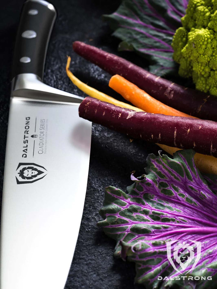Dalstrong gladiator series 8 inch chef knife with black handle with different kinds of vegetables.