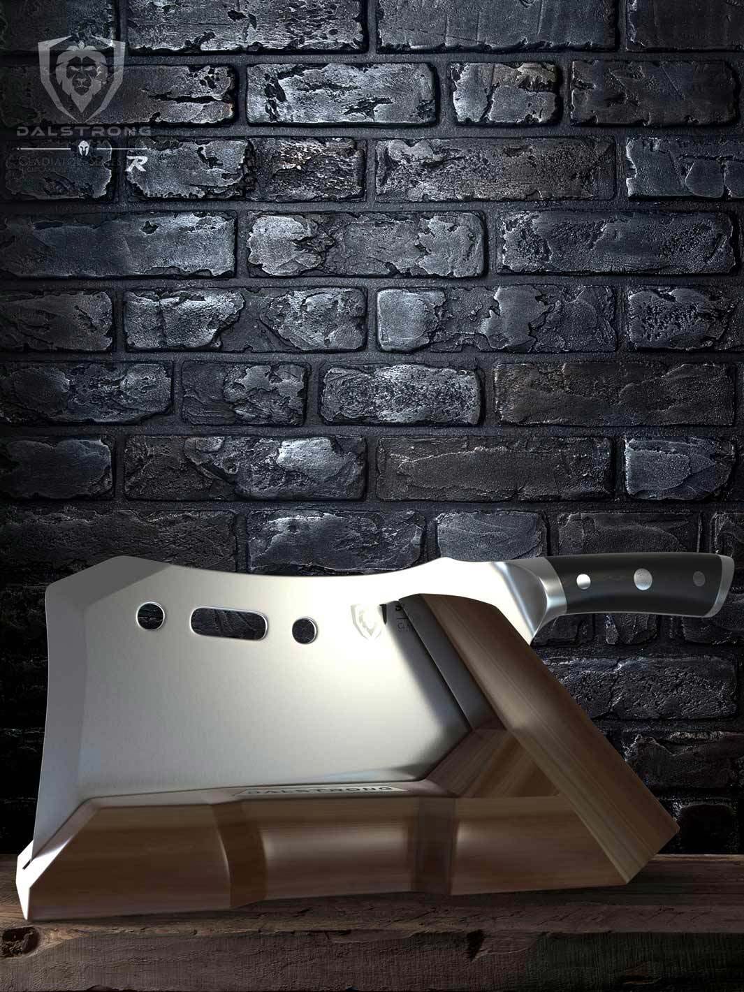 Dalstrong gladiator series 9 inch obliterator cleaver knife with black handle and premium stand on top of a wooden table.