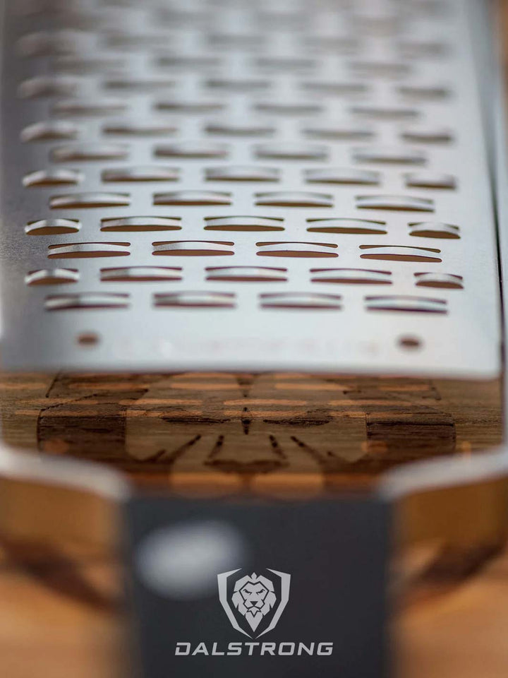 Dalstrong professional ribbon wide cheese grater featuring it's stainless grater.
