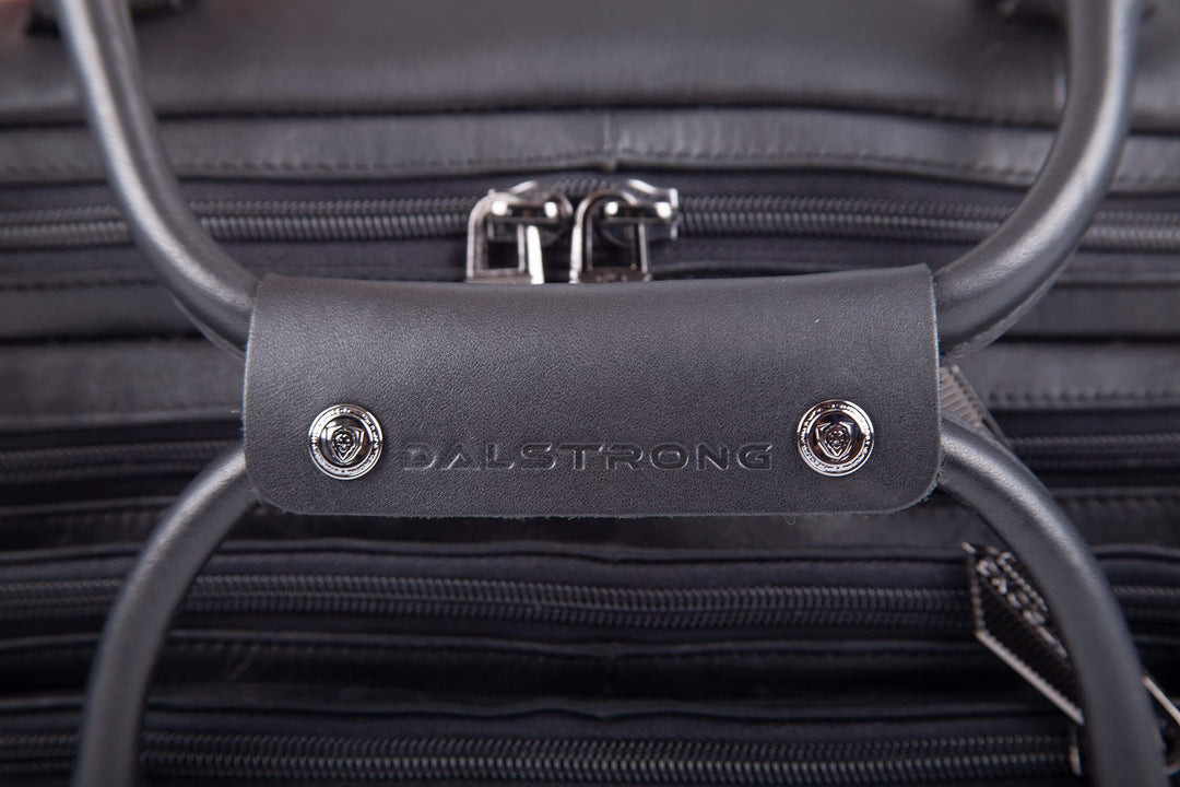 Dalstrong the culinary commander premium 4 pocket knife bag featuring it's handle with dalstrong engraved on it.
