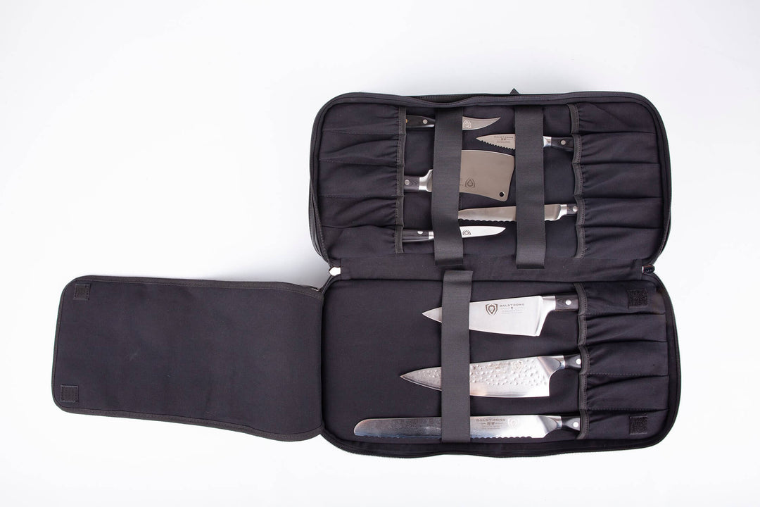 Dalstrong the culinary commander premium 4 pocket knife bag with knives inside on a white background.