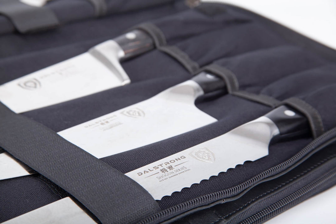 Dalstrong the culinary commander premium 4 pocket knife bag with knives inside.
