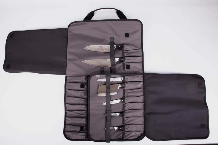 Dalstrong ballistic series graphite black knife roll with knives inside.