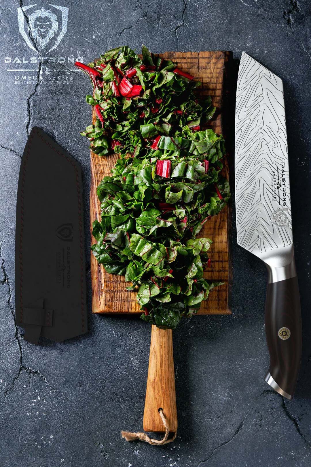Dalstrong omega series 7 inch santoku knife with chopped herbs on a board.