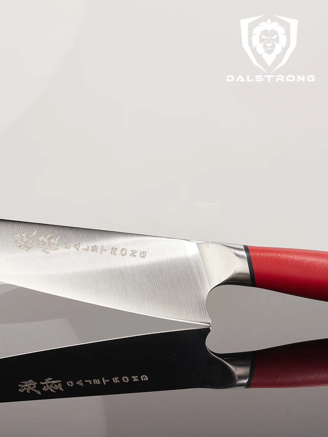 Dalstrong phantom series 8 inch chef knife with red handle featuring it's japanese blade.