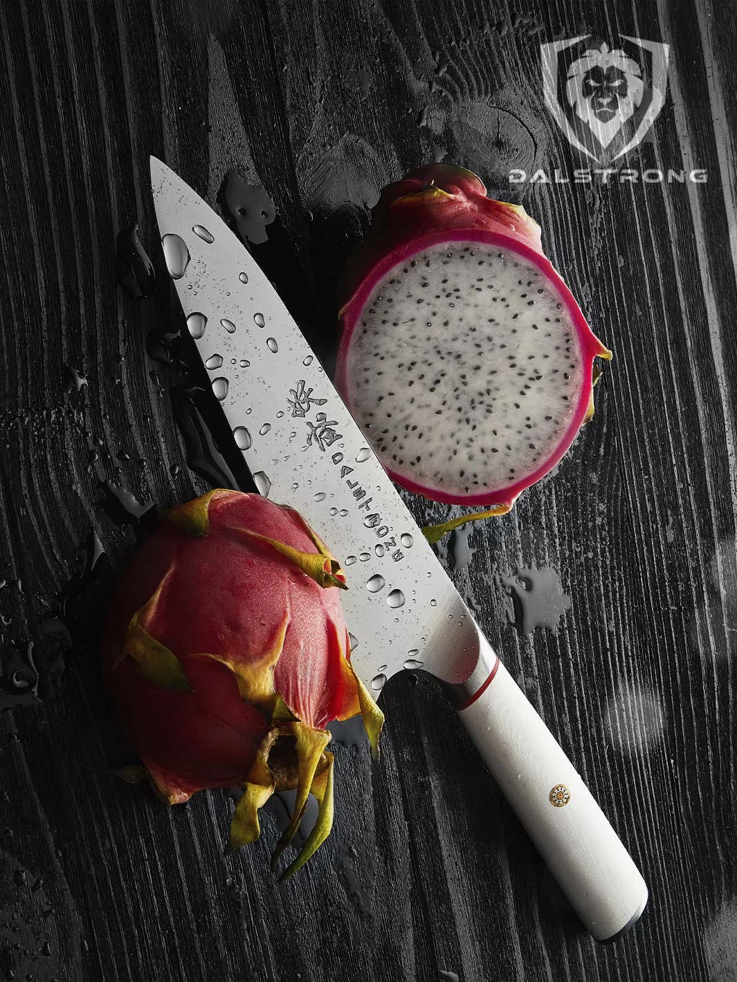 Dalstrong phantom series 8 inch chef knife with a dragon fruit cut in half.