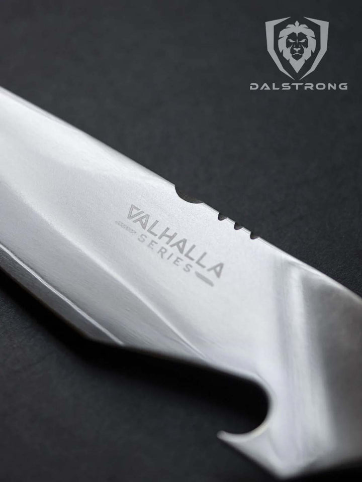 Dalstrong valhalla series 6 inch piranha knife featuring it's sharp shining blade.