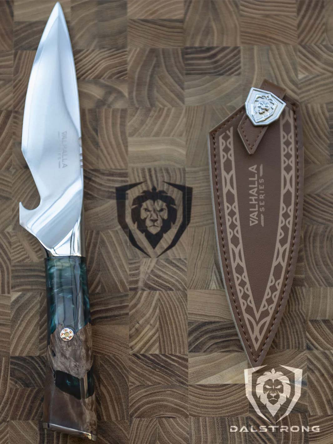 Dalstrong valhalla series 6 inch piranha knife with wooden handle and sheath on a cutting board.