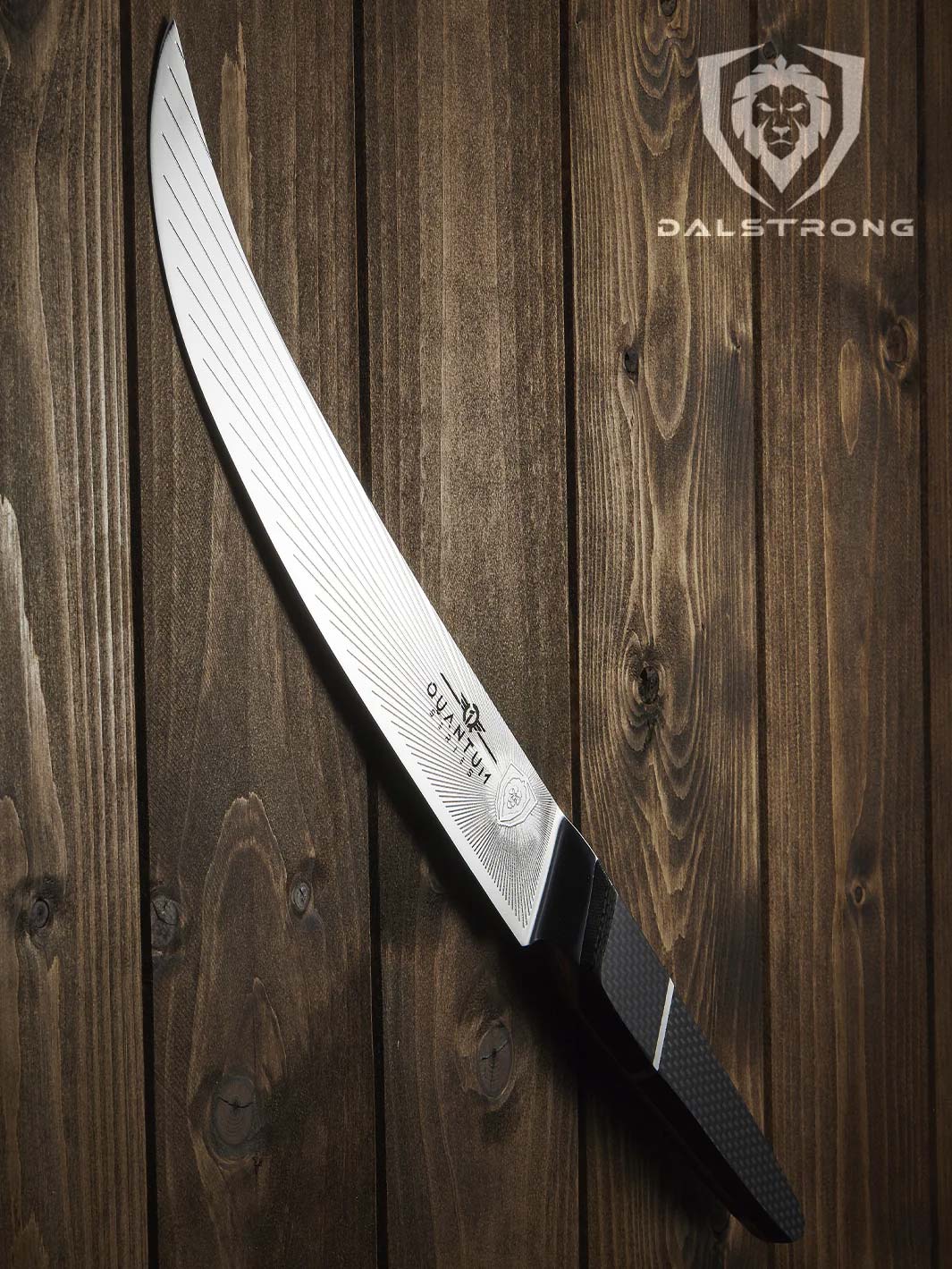 Dalstrong quantum 1 series 10 inch butcher knife with dragon skin handle on top of a wooden table.