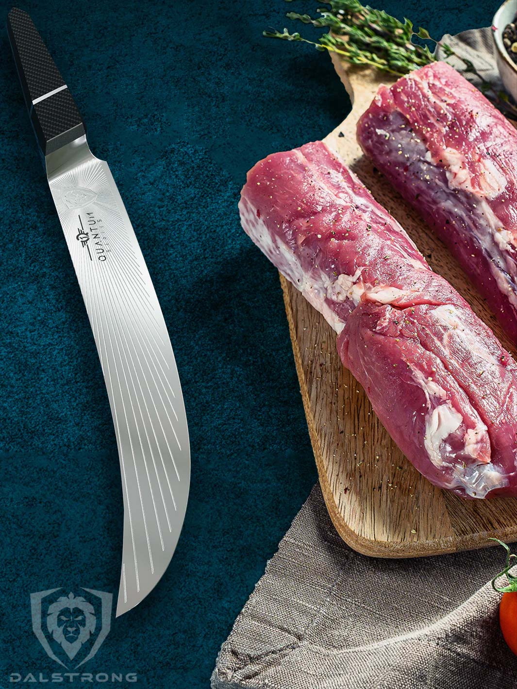 Dalstrong quantum 1 series 10 inch butcher knife with dragon skin handle and two cuts of loin on a cutting board.