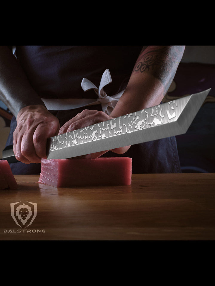 Dalstrong roning series 17 inch tuna knife with black handle and sliced tuna meat.