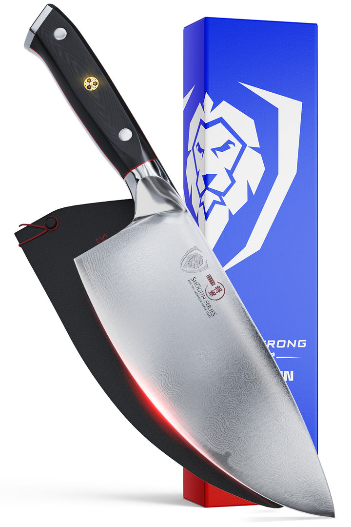 Dalstrong shogun series 7 inch rocker cleaver knife with black handle in front of it's premium packaging.