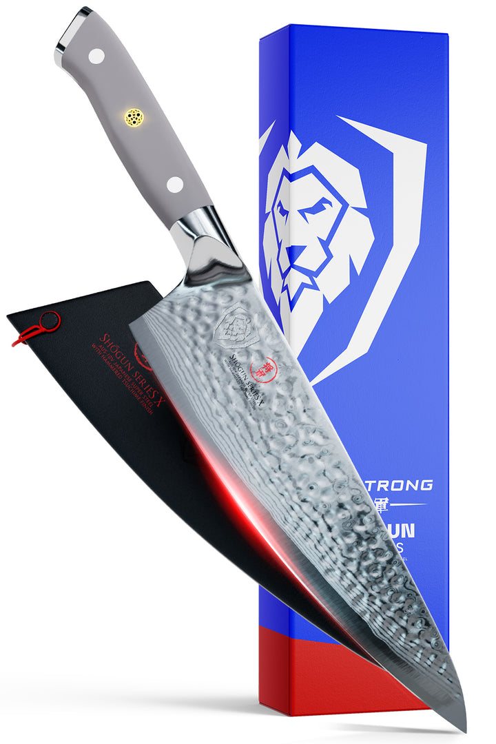 Dalstrong shogun series 8 inch chef knife with gray matte handle in front of it's premium packaging.