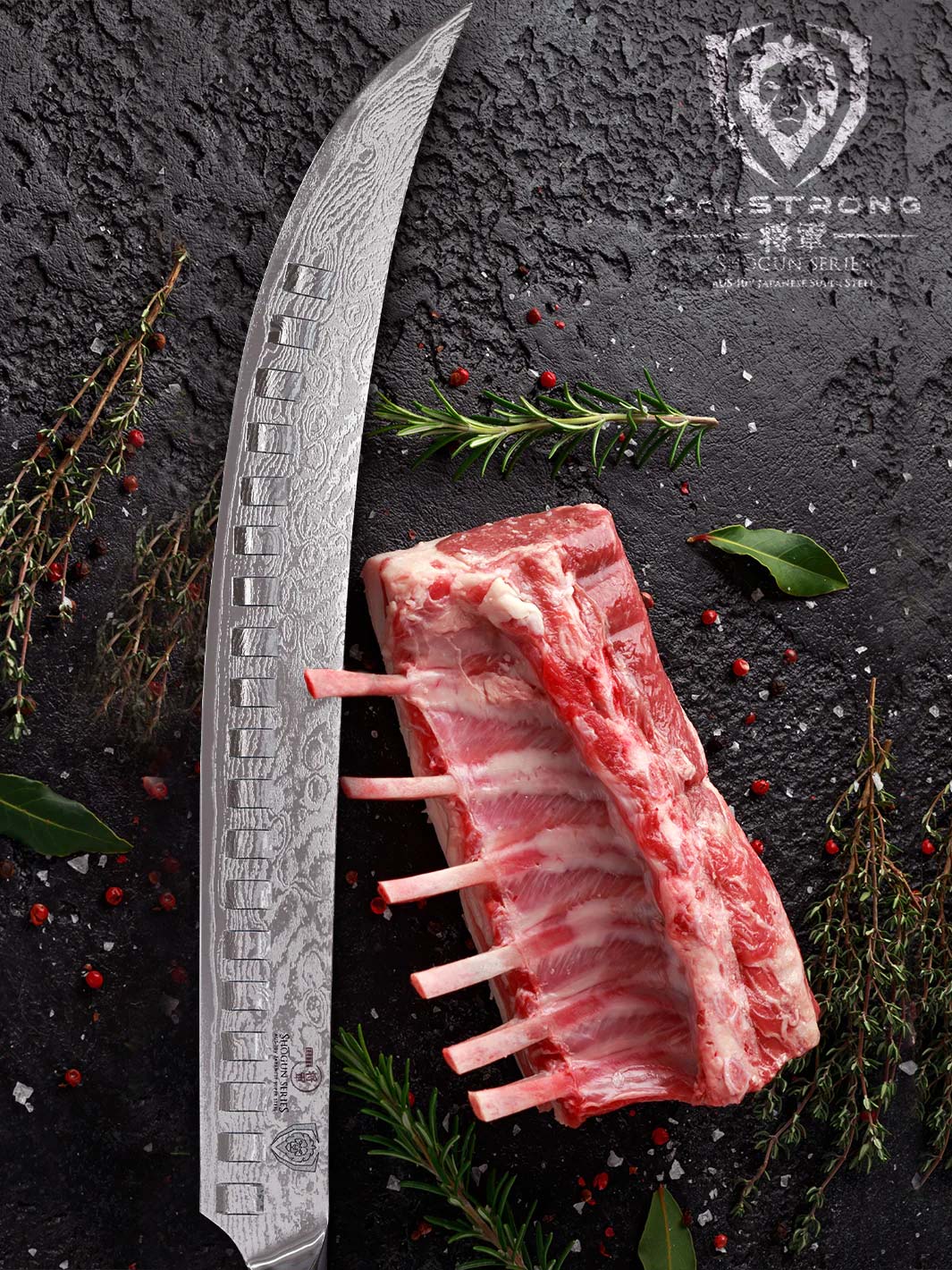 Dalstrong shogun series 12.5 inch butcher knife with a rack of rib beside it.