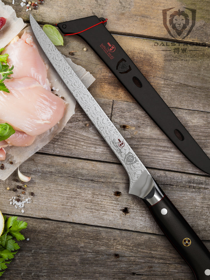 Dalstrong shogun series 8 inch boning knife with black handle and sheath beside a fillets of chicken meat.