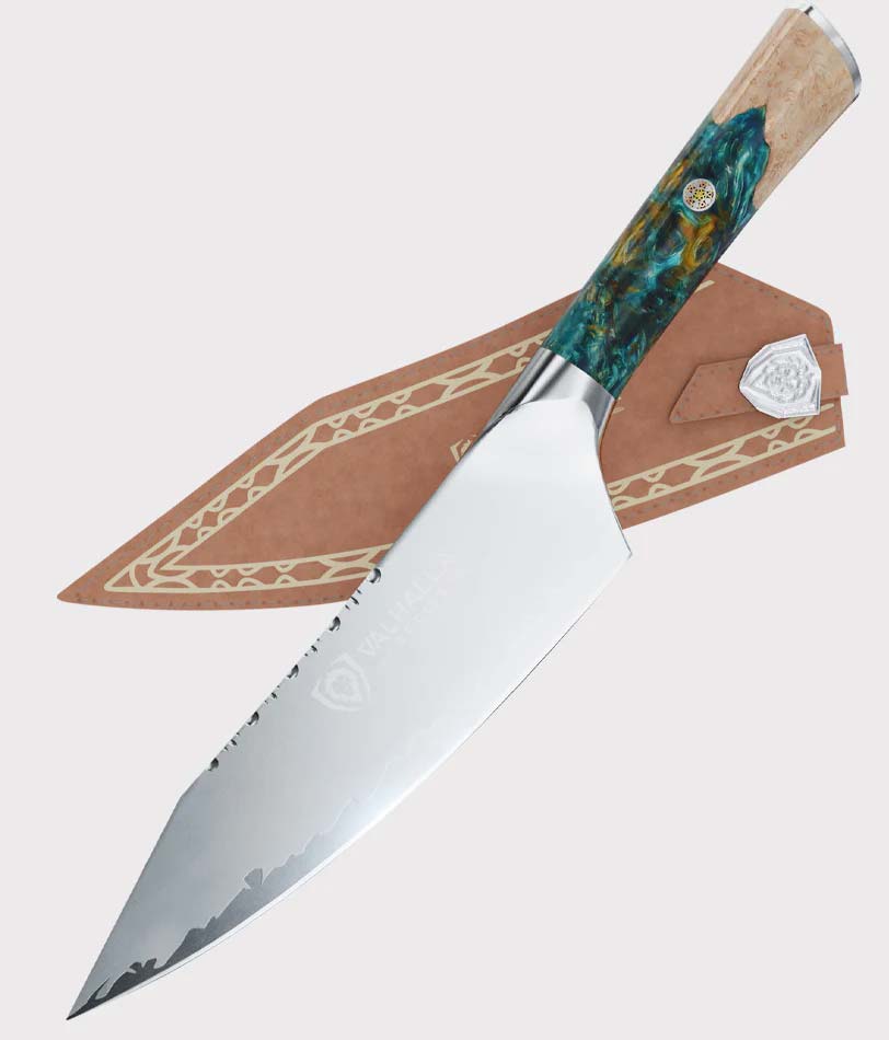 Dalstrong valhalla series 8 inch chef knife with glacial white handle and brown sheath.