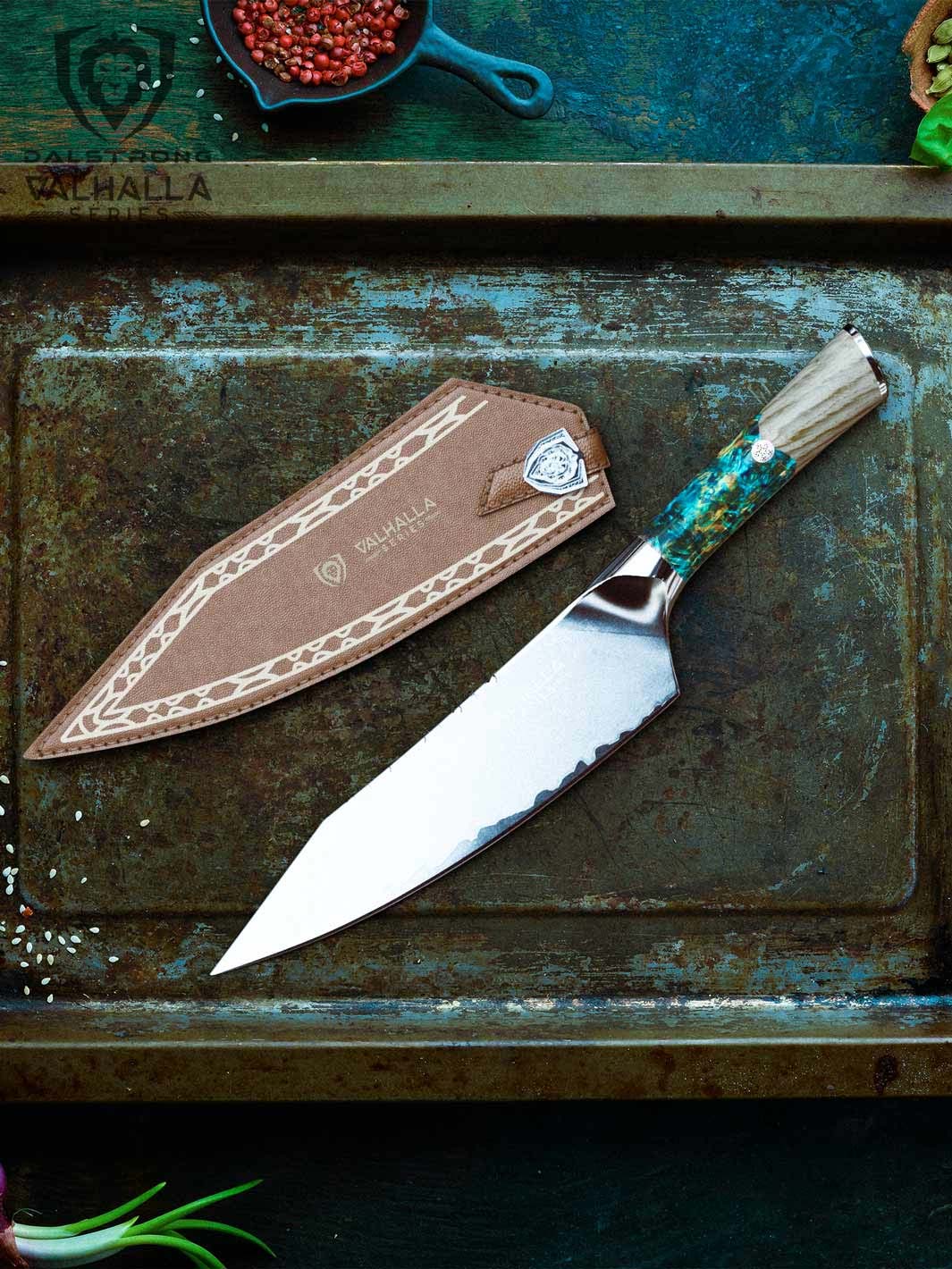 Dalstrong valhalla series 8 inch chef knife with wooden handle and sheath inside an old tray.