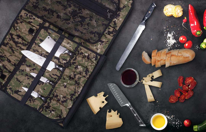 Dalstrong ballistic series camouflage premium knife roll beside some knives, chilli and cheese.