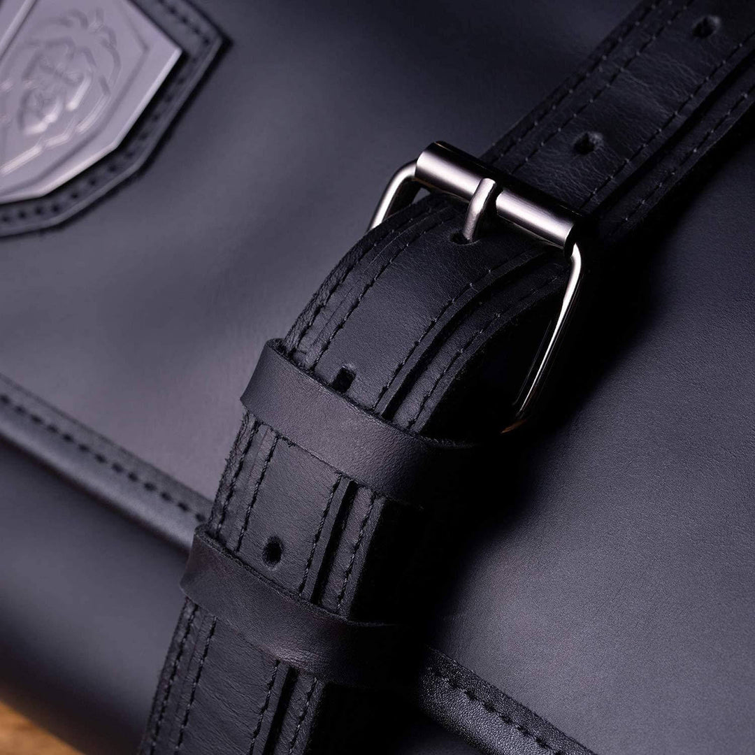 Dalstrong full grain leather midnight black vagabond knife roll showcasing it's leather strap.