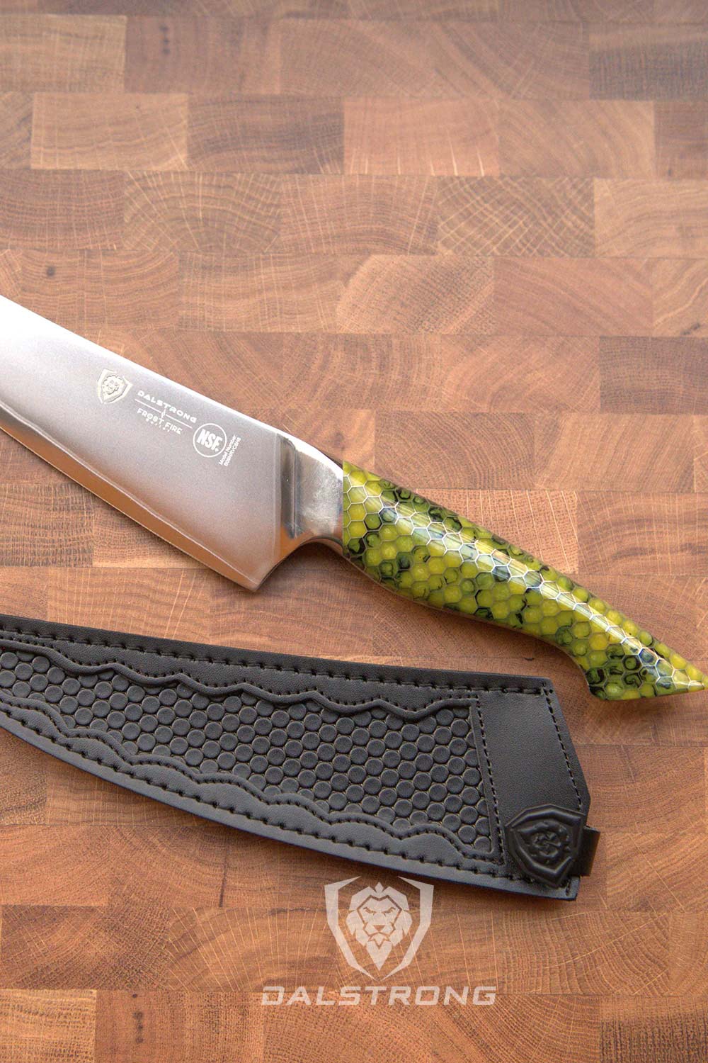 Dalstrong frost fire series 8 inch chef knife with dragon skin handle and it's black sheath.