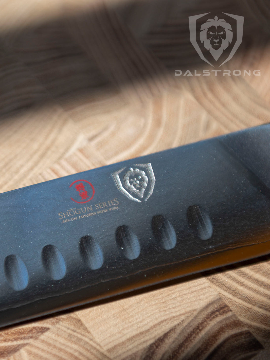 Dalstrong shogun series 12 inch slicer knife with crimson red handle featuring the Dalstrong logo and blade.