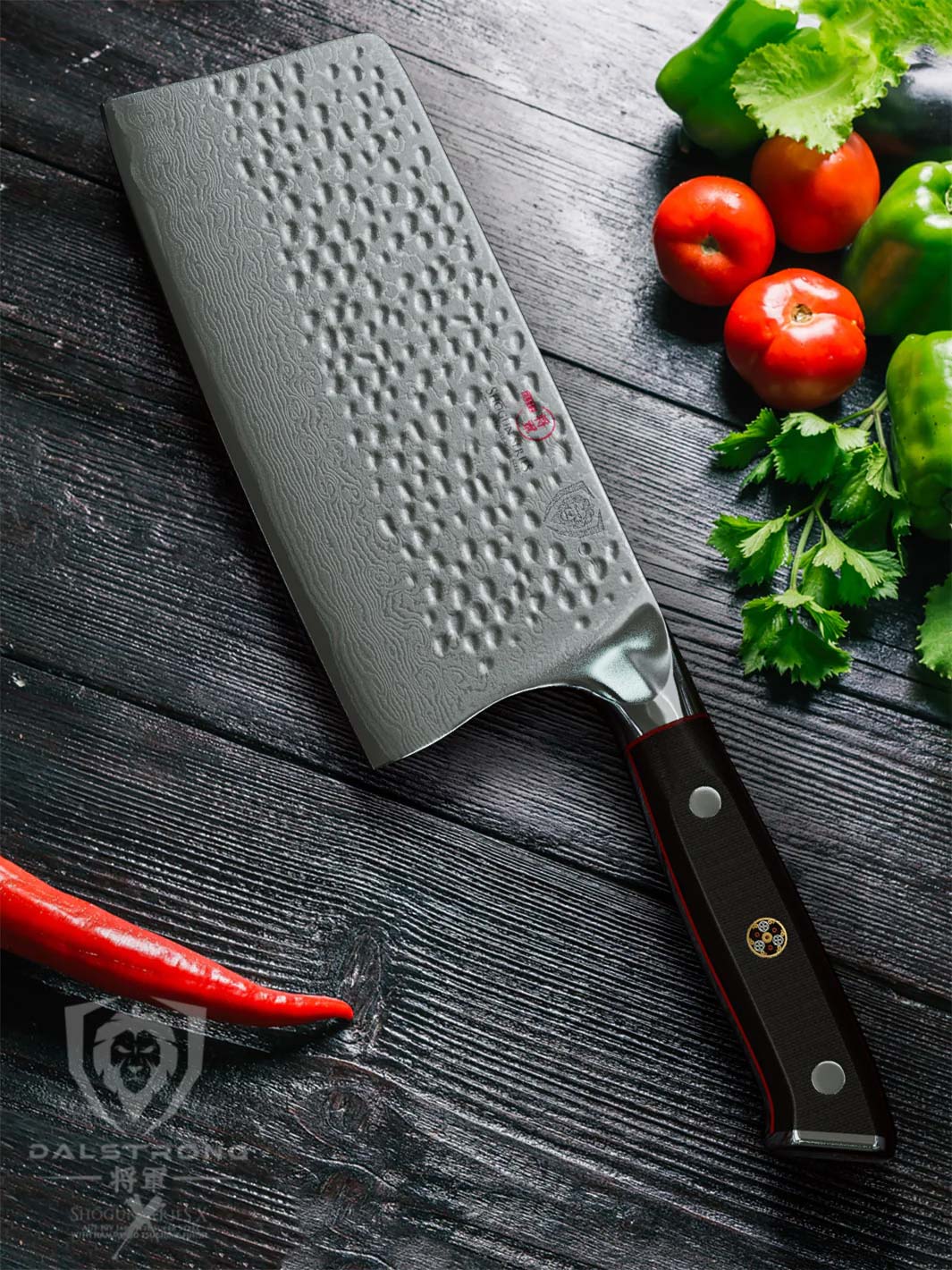 Dalstrong shogun series 7 inch cleaver knife with black handle and vegetables beside.