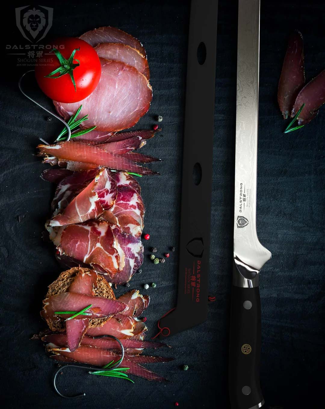 Dalstrong shogun series 12 inch spanish slicer knife with black handle and different slices of ham on the side.